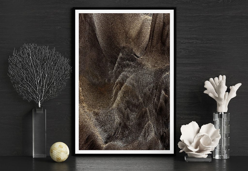 Wrafts of Mist": Abstract close-up photograph depicting swirling patterns in a mixture of volcanic black sand and white beach sand on the shores of Bali, Indonesia. Evokes the transient beauty of mist flowing around mountain ranges. Wall Art Display for Framed Fine Art Photography.