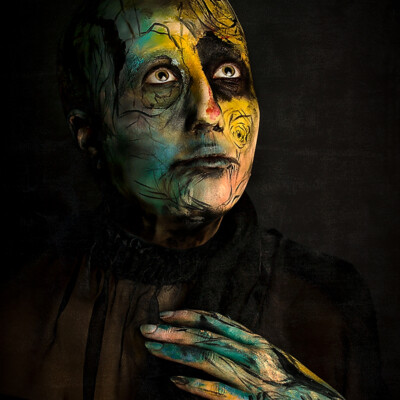 Explore the limitless creativity of abstract body art with model Celine M. as she becomes a living masterpiece. Makeup, baldness and photography by Anett Alexandra Bulano. 🎨✨ #AbstractArt #BodyPainting #ExpressiveCreativity Abstract body art photography featuring model Celine M., adorned in swirling strokes of vibrant greens, yellows, blues and reds, with a bold baldcap setting the tone of the canvas.