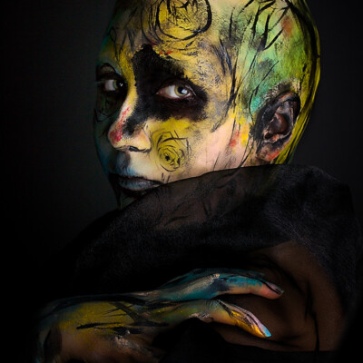 Explore the boundless creativity of abstract body art with model Celine M. as she becomes a living masterpiece. Makeup, baldcap, and photography by Anett Alexandra Bulano. 🎨✨ #AbstractArt #BodyPainting #ExpressiveCreativity Abstract body art photography featuring model Celine M. adorned in swirling strokes of vibrant greens, yellows, blues, and reds, with a bold baldcap accentuating the canvas.