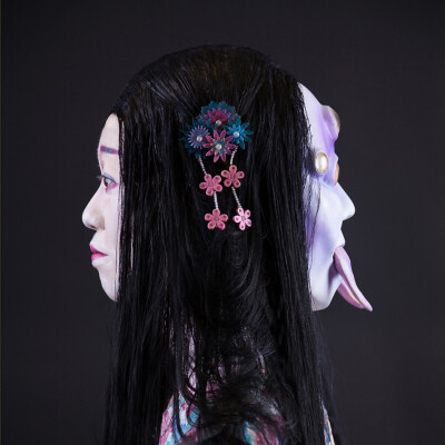 Witness the convergence of beauty and myth as Anett Alexandra Bulano unveils her spellbinding creation—a geisha adorned in elegance, yet haunted by the spirit of Tsuchigumo. 🕷️✨ #GeishaMakeup #JapaneseFolklore #SFXArtistry Side profile of a geisha adorned with traditional makeup and a Heian-period wig, juxtaposed with a spider mask featuring six yellow eyes and fangs. Created by makeup artist Anett Alexandra Bulano, inspired by Japanese folklore.